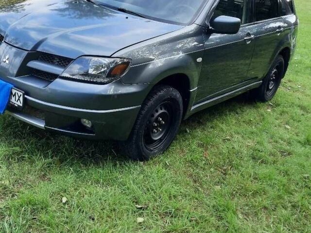 Сірий Міцубісі Аіртрек, об'ємом двигуна 2.4 л та пробігом 299 тис. км за 6099 $, фото 1 на Automoto.ua