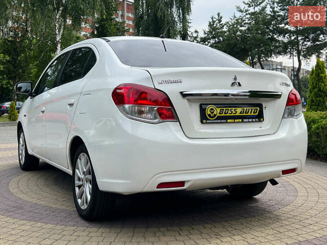 Мицубиси Эттрейдж 2014 в Львове на Automoto.ua Белый Мицубиси Эттрейдж, объемом двигателя 1.2 л и пробегом 191 тыс. км за 5999 $, фото 4 на Automoto.ua