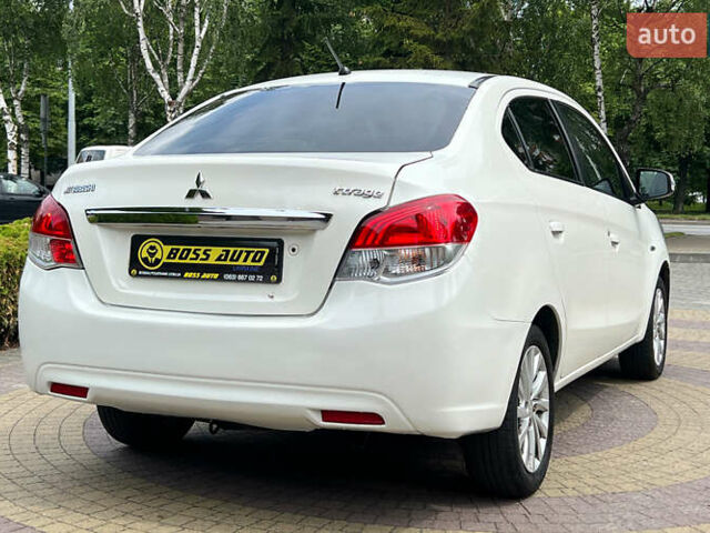 Мицубиси Эттрейдж 2014 в Львове на Automoto.ua Белый Мицубиси Эттрейдж, объемом двигателя 1.2 л и пробегом 191 тыс. км за 5999 $, фото 6 на Automoto.ua