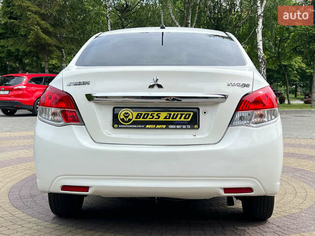 Мицубиси Эттрейдж 2014 в Львове на Automoto.ua Белый Мицубиси Эттрейдж, объемом двигателя 1.2 л и пробегом 191 тыс. км за 5999 $, фото 5 на Automoto.ua