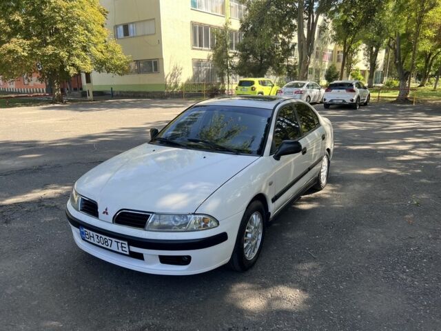 Білий Міцубісі Харизма, об'ємом двигуна 1.8 л та пробігом 276 тис. км за 2999 $, фото 1 на Automoto.ua