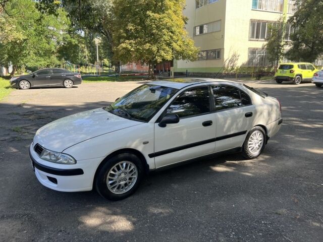 Білий Міцубісі Харизма, об'ємом двигуна 1.8 л та пробігом 276 тис. км за 2999 $, фото 2 на Automoto.ua