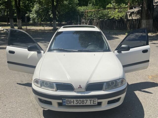 Білий Міцубісі Харизма, об'ємом двигуна 1.8 л та пробігом 276 тис. км за 2999 $, фото 5 на Automoto.ua