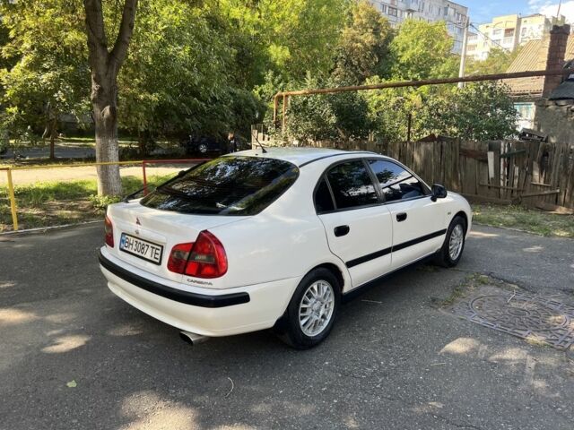 Білий Міцубісі Харизма, об'ємом двигуна 1.8 л та пробігом 276 тис. км за 2999 $, фото 3 на Automoto.ua