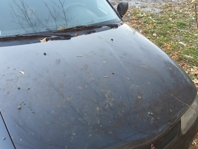 Міцубісі Харизма 1997 у Краматорске на Automoto.ua Чорний Міцубісі Харизма, об'ємом двигуна 0 л та пробігом 100 тис. км за 716 $, фото 1 на Automoto.ua