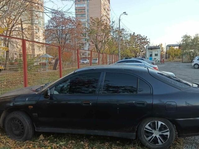 Міцубісі Харизма 1997 у Краматорске на Automoto.ua Чорний Міцубісі Харизма, об'ємом двигуна 0 л та пробігом 100 тис. км за 716 $, фото 2 на Automoto.ua
