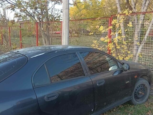 Міцубісі Харизма 1997 у Краматорске на Automoto.ua Чорний Міцубісі Харизма, об'ємом двигуна 0 л та пробігом 100 тис. км за 716 $, фото 4 на Automoto.ua