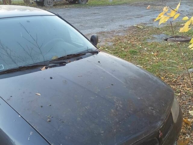 Міцубісі Харизма 1997 у Краматорске на Automoto.ua Чорний Міцубісі Харизма, об'ємом двигуна 0 л та пробігом 100 тис. км за 716 $, фото 3 на Automoto.ua