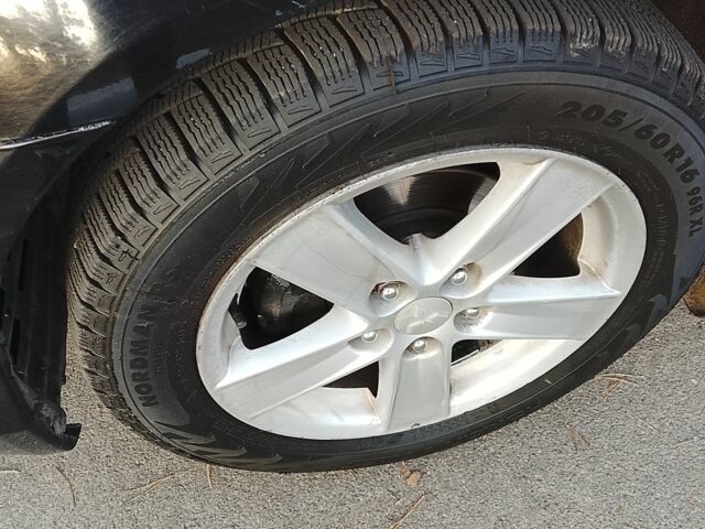 Черный Мицубиси Харизма, объемом двигателя 1.5 л и пробегом 230 тыс. км за 5300 $, фото 4 на Automoto.ua