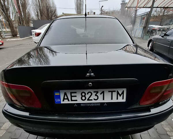 Черный Мицубиси Харизма, объемом двигателя 1.6 л и пробегом 280 тыс. км за 2600 $, фото 13 на Automoto.ua
