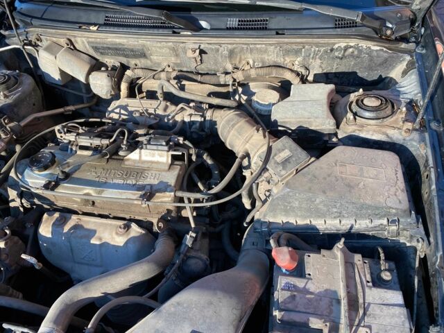 Черный Мицубиси Харизма, объемом двигателя 1.6 л и пробегом 30 тыс. км за 3000 $, фото 5 на Automoto.ua