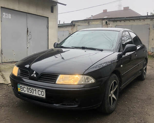 Чорний Міцубісі Харизма, об'ємом двигуна 1.6 л та пробігом 270 тис. км за 4300 $, фото 6 на Automoto.ua