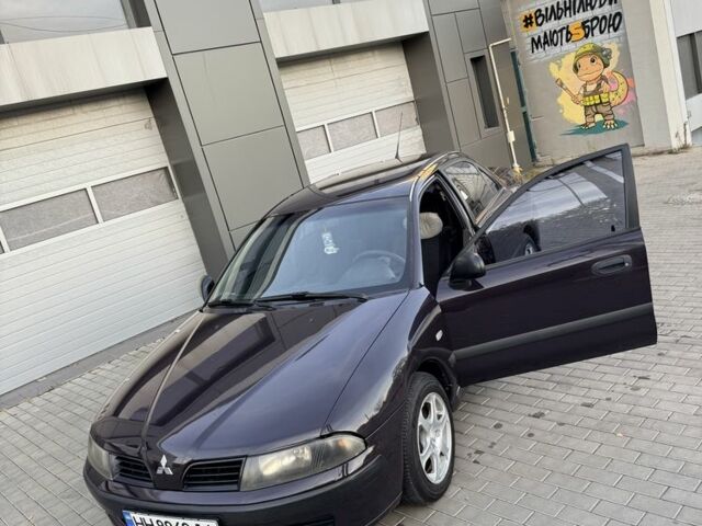 Фіолетовий Міцубісі Харизма, об'ємом двигуна 1.6 л та пробігом 236 тис. км за 3000 $, фото 6 на Automoto.ua