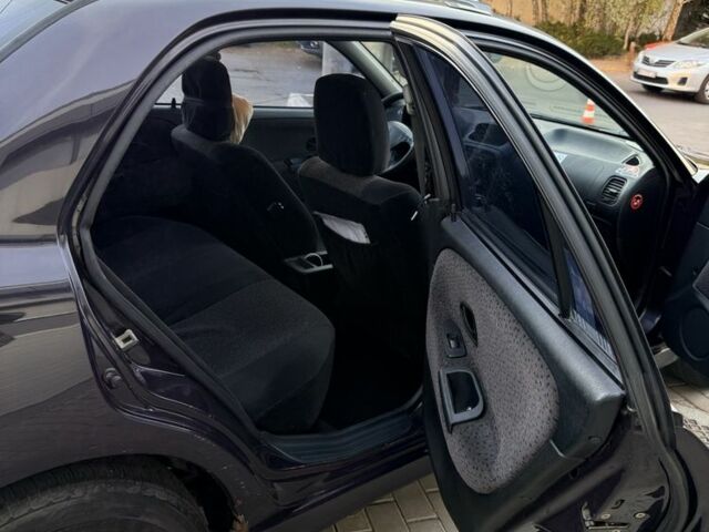 Фіолетовий Міцубісі Харизма, об'ємом двигуна 1.6 л та пробігом 236 тис. км за 3000 $, фото 7 на Automoto.ua