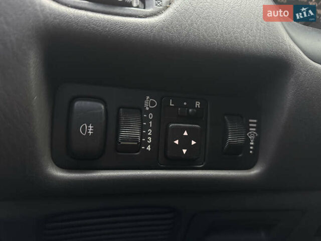 Красный Мицубиси Харизма, объемом двигателя 1.84 л и пробегом 172 тыс. км за 2990 $, фото 14 на Automoto.ua