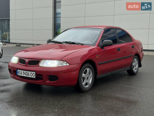 Красный Мицубиси Харизма, объемом двигателя 1.84 л и пробегом 172 тыс. км за 2990 $, фото 2 на Automoto.ua
