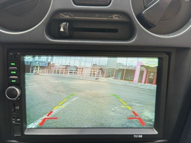 Красный Мицубиси Харизма, объемом двигателя 1.8 л и пробегом 257 тыс. км за 3100 $, фото 12 на Automoto.ua