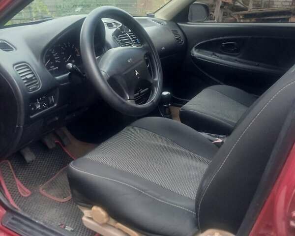 Міцубісі Харизма 1996 у Кролевце на Automoto.ua Червоний Міцубісі Харизма, об'ємом двигуна 1.6 л та пробігом 340 тис. км за 1700 $, фото 8 на Automoto.ua