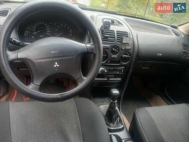 Міцубісі Харизма 1996 у Кролевце на Automoto.ua Червоний Міцубісі Харизма, об'ємом двигуна 1.6 л та пробігом 340 тис. км за 1700 $, фото 2 на Automoto.ua