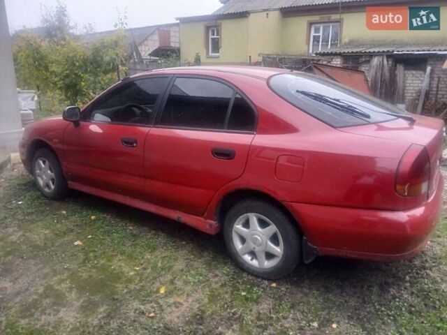 Міцубісі Харизма 1996 у Кролевце на Automoto.ua Червоний Міцубісі Харизма, об'ємом двигуна 1.6 л та пробігом 340 тис. км за 1700 $, фото 9 на Automoto.ua