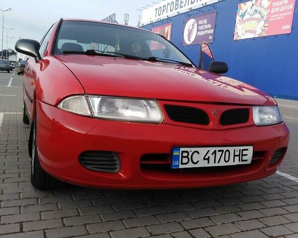 Красный Мицубиси Харизма, объемом двигателя 1.6 л и пробегом 270 тыс. км за 3000 $, фото 15 на Automoto.ua