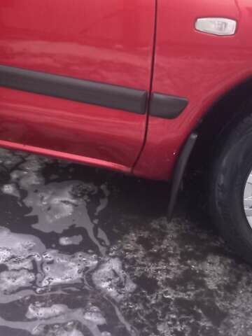 Красный Мицубиси Харизма, объемом двигателя 1.6 л и пробегом 450 тыс. км за 3000 $, фото 12 на Automoto.ua