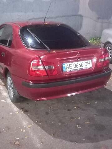 Красный Мицубиси Харизма, объемом двигателя 1.6 л и пробегом 450 тыс. км за 3000 $, фото 8 на Automoto.ua