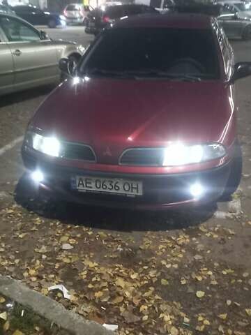 Красный Мицубиси Харизма, объемом двигателя 1.6 л и пробегом 450 тыс. км за 3000 $, фото 10 на Automoto.ua