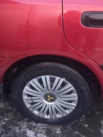 Красный Мицубиси Харизма, объемом двигателя 1.6 л и пробегом 450 тыс. км за 3000 $, фото 11 на Automoto.ua