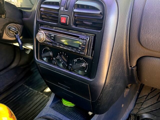 Мицубиси Харизма, объемом двигателя 1.9 л и пробегом 0 тыс. км за 2600 $, фото 4 на Automoto.ua