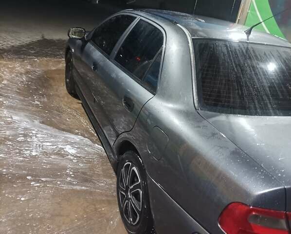 Мицубиси Харизма, объемом двигателя 0 л и пробегом 250 тыс. км за 3200 $, фото 5 на Automoto.ua