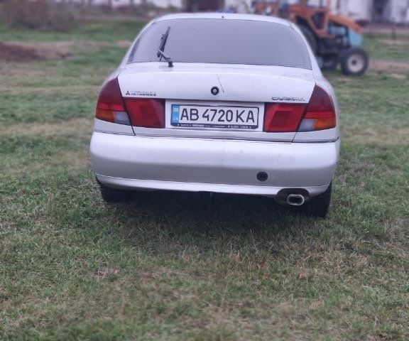 Серый Мицубиси Харизма, объемом двигателя 1.6 л и пробегом 1 тыс. км за 1400 $, фото 4 на Automoto.ua