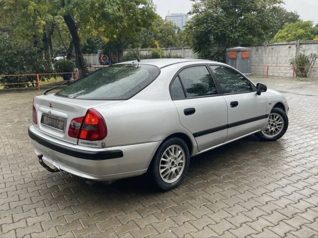 Сірий Міцубісі Харизма, об'ємом двигуна 1.9 л та пробігом 400 тис. км за 2800 $, фото 4 на Automoto.ua