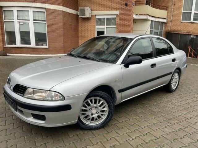 Сірий Міцубісі Харизма, об'ємом двигуна 1.9 л та пробігом 400 тис. км за 2800 $, фото 1 на Automoto.ua