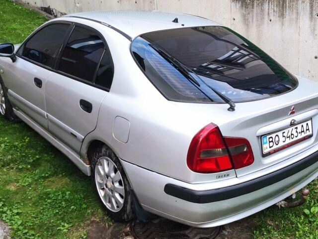 Сірий Міцубісі Харизма, об'ємом двигуна 1.9 л та пробігом 183 тис. км за 2500 $, фото 3 на Automoto.ua