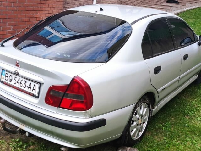 Сірий Міцубісі Харизма, об'ємом двигуна 1.9 л та пробігом 183 тис. км за 2500 $, фото 2 на Automoto.ua