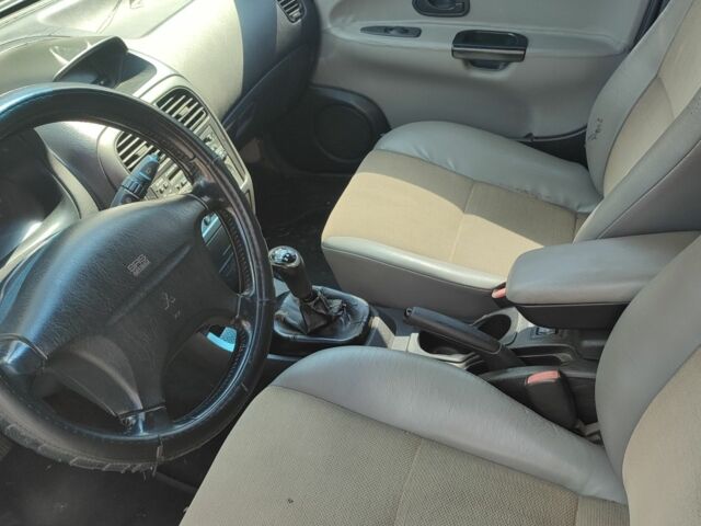 Мицубиси Харизма 2002 в Кривом Роге на Automoto.ua Серый Мицубиси Харизма, объемом двигателя 1.8 л и пробегом 287 тыс. км за 3300 $, фото 3 на Automoto.ua