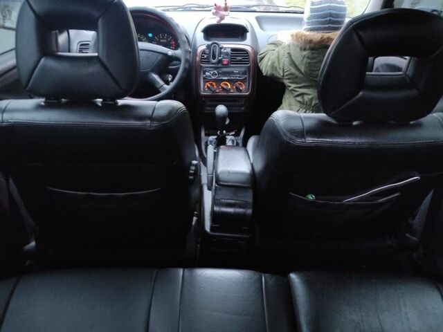 Сірий Міцубісі Харизма, об'ємом двигуна 1.8 л та пробігом 379 тис. км за 1307 $, фото 5 на Automoto.ua