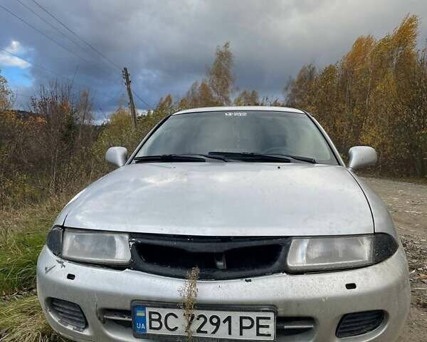 Серый Мицубиси Харизма, объемом двигателя 1.6 л и пробегом 270 тыс. км за 750 $, фото 6 на Automoto.ua