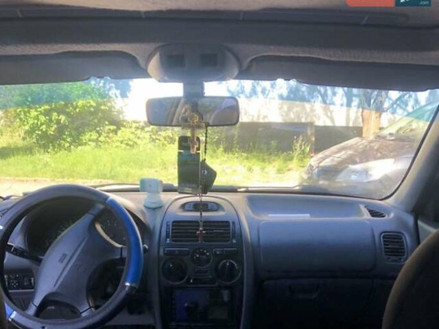 Серый Мицубиси Харизма, объемом двигателя 1.6 л и пробегом 260 тыс. км за 2000 $, фото 1 на Automoto.ua