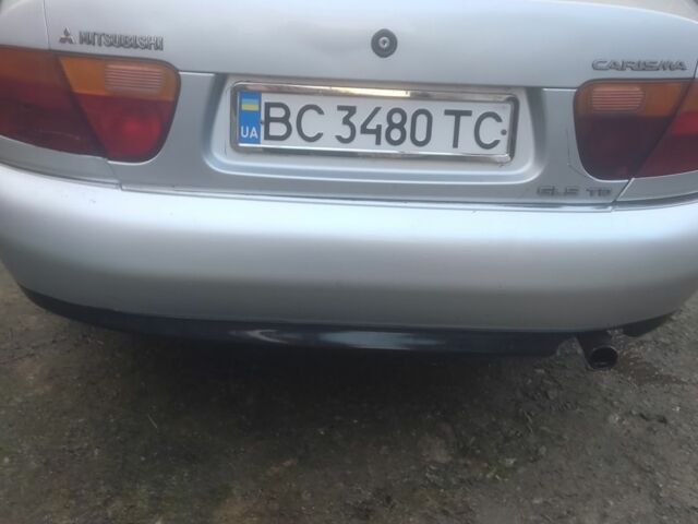 Серый Мицубиси Харизма, объемом двигателя 1.9 л и пробегом 280 тыс. км за 1200 $, фото 6 на Automoto.ua