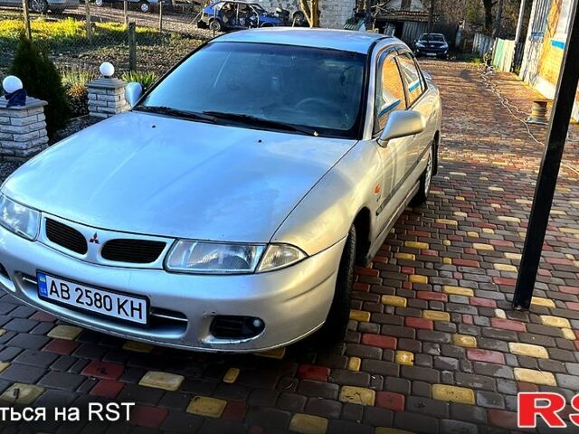 Сірий Міцубісі Харизма, об'ємом двигуна 1.8 л та пробігом 296 тис. км за 1600 $, фото 11 на Automoto.ua