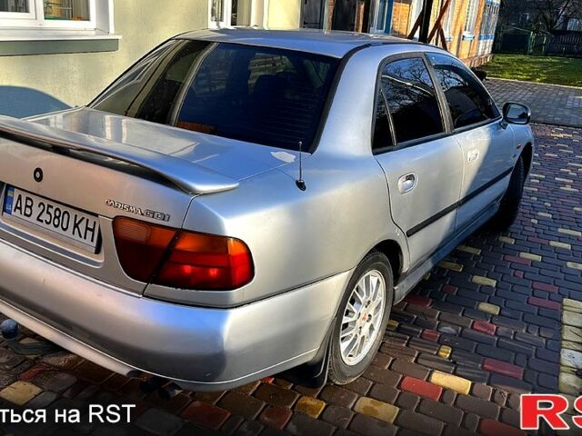 Сірий Міцубісі Харизма, об'ємом двигуна 1.8 л та пробігом 296 тис. км за 1600 $, фото 4 на Automoto.ua