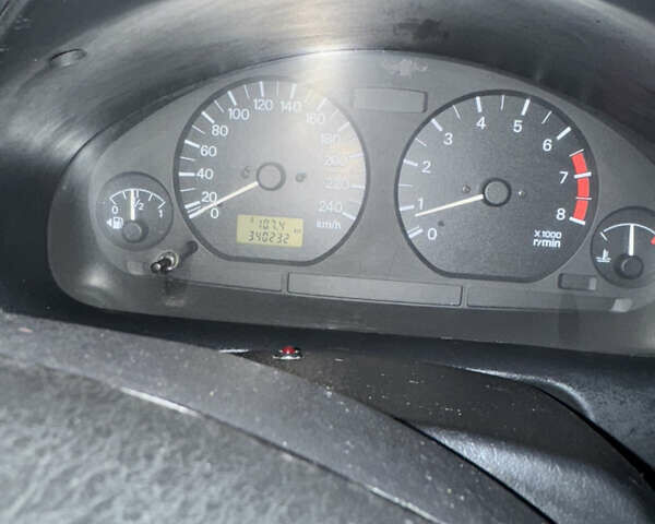 Серый Мицубиси Харизма, объемом двигателя 1.6 л и пробегом 340 тыс. км за 2000 $, фото 11 на Automoto.ua