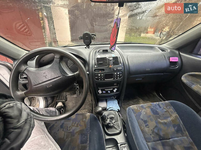 Сірий Міцубісі Харизма, об'ємом двигуна 1.9 л та пробігом 368 тис. км за 1000 $, фото 7 на Automoto.ua