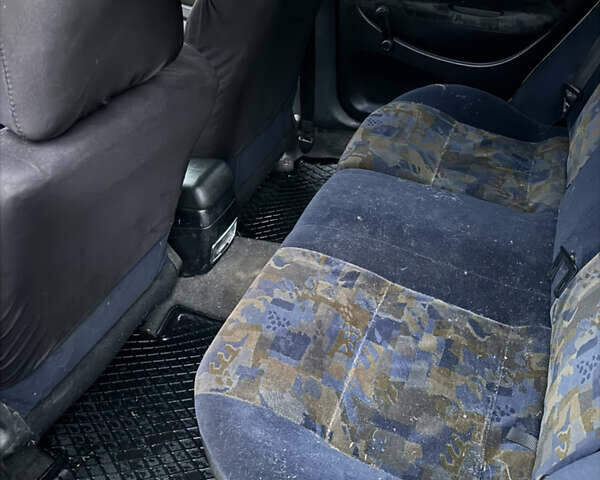 Серый Мицубиси Харизма, объемом двигателя 1.6 л и пробегом 340 тыс. км за 2000 $, фото 15 на Automoto.ua