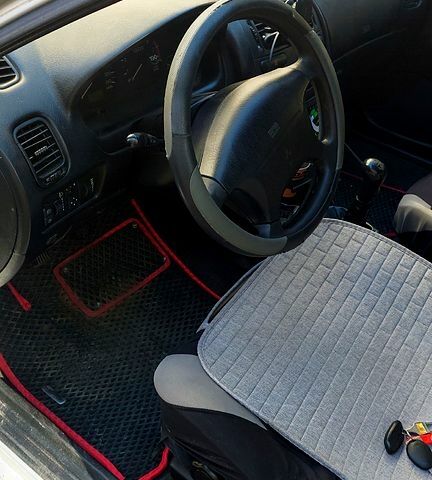 Серый Мицубиси Харизма, объемом двигателя 1.8 л и пробегом 320 тыс. км за 1600 $, фото 6 на Automoto.ua