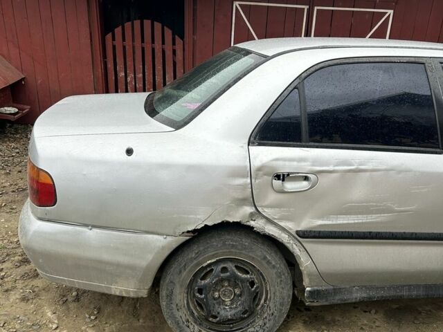 Сірий Міцубісі Харизма, об'ємом двигуна 1.9 л та пробігом 350 тис. км за 1000 $, фото 3 на Automoto.ua