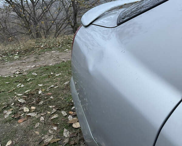 Серый Мицубиси Харизма, объемом двигателя 1.6 л и пробегом 340 тыс. км за 2000 $, фото 5 на Automoto.ua