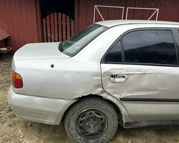 Сірий Міцубісі Харизма, об'ємом двигуна 1.9 л та пробігом 368 тис. км за 1000 $, фото 4 на Automoto.ua